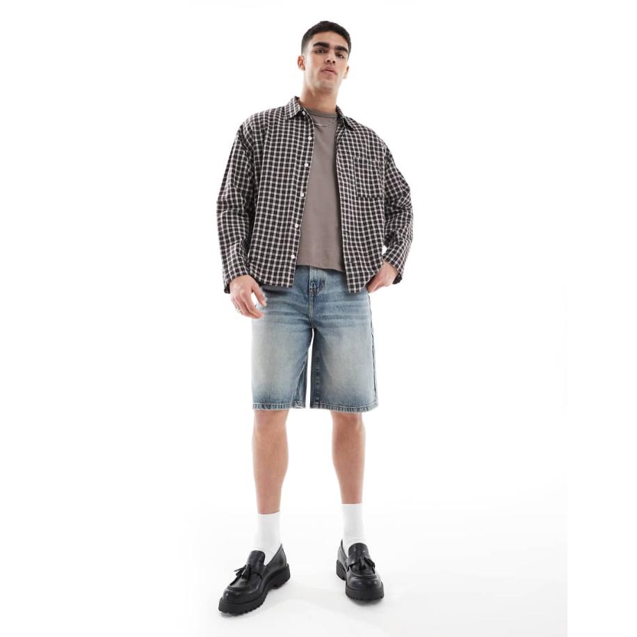 ASOS DESIGN - Langere denim jort in lichtblauwe wassing met tint Blauw