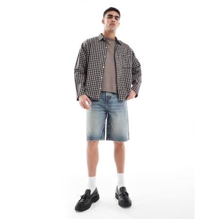 ASOS DESIGN - Langere denim jort in lichtblauwe wassing met tint