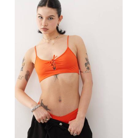 Monki Mix en match Bikinitopje met lage ronde hals en gestrikte voorkant in perzikkleur-Oranje