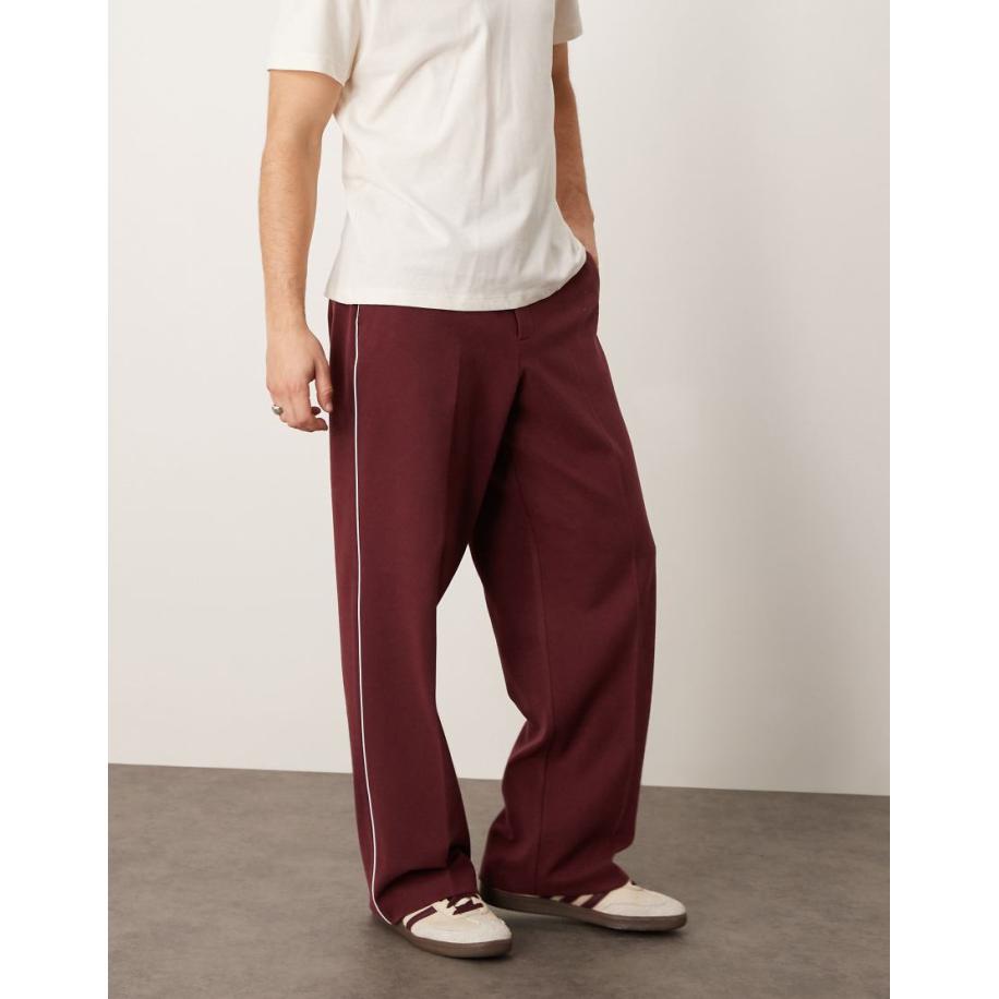 ASOS DESIGN - Nette broek met wijde pijpen en bies langs de zijkant in bordeauxrood Rood