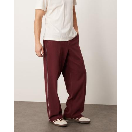 ASOS DESIGN - Nette broek met wijde pijpen en bies langs de zijkant in bordeauxrood