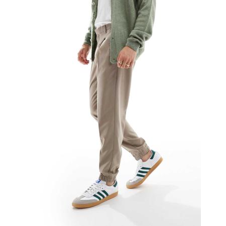 ASOS DESIGN - Nette toelopende broek met joggerboorden in stone-Neutraal