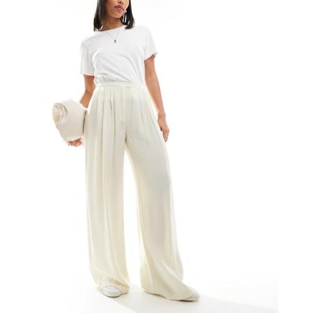 Stradivarius Broek met soepele plooien aan de voorkant in karnemelkkleur-Geel