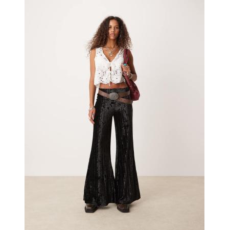 Free People Broek van fluweel met wijde pijpen en plooien in zwart