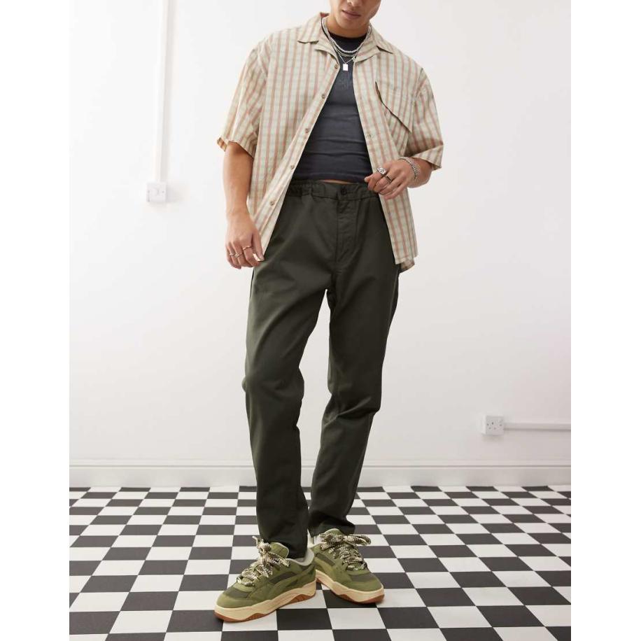 Dr Denim - Rush - Elegante toelopende chino broek met elastische tailleband en trekkoord in bosgroen Groen