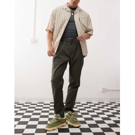 Dr Denim - Rush - Elegante toelopende chino broek met elastische tailleband en trekkoord in bosgroen