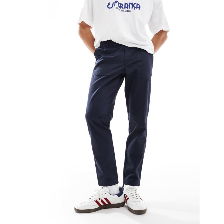 ASOS DESIGN - Smaltoelopende broek in marineblauw Blauw