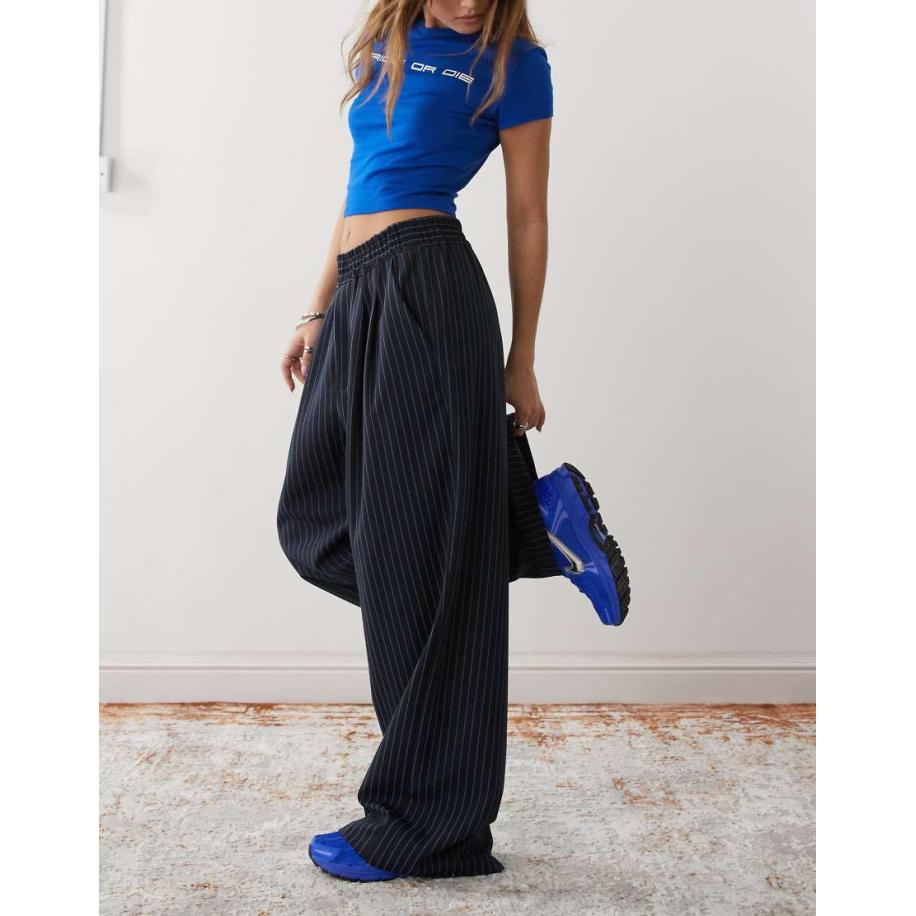 COLLUSION Ruimvallende gestreepte broek in blauw Blauw