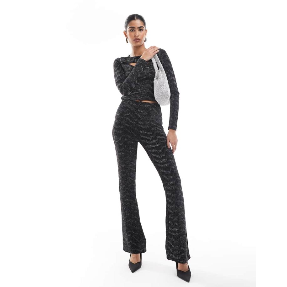 Vero Moda Flare-broek in zwart en zilveren glitter, deel van co-ord set Zwart