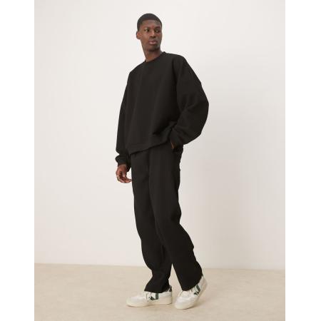 ASOS DESIGN - Plissé joggingbroek met smaltoelopende pasvorm in zwart, deel van co-ord set