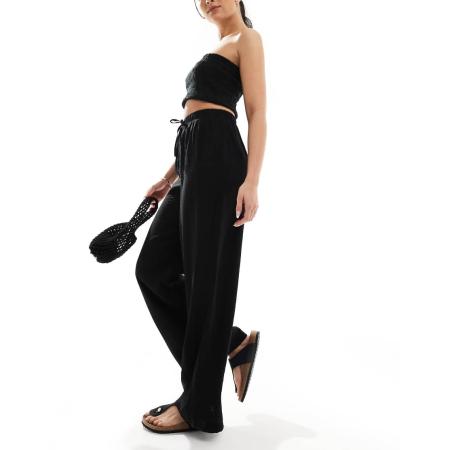 New Look Broek met wijde pijpen van kreukstof in zwart