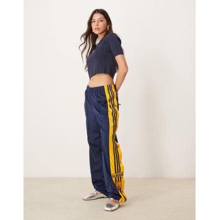 adidas Originals Adibreak Trainingsbroek in marineblauw en geel