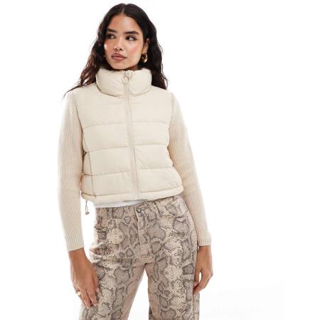 Stradivarius Gewatteerd jack met gebreide mouwen in beige-Neutraal