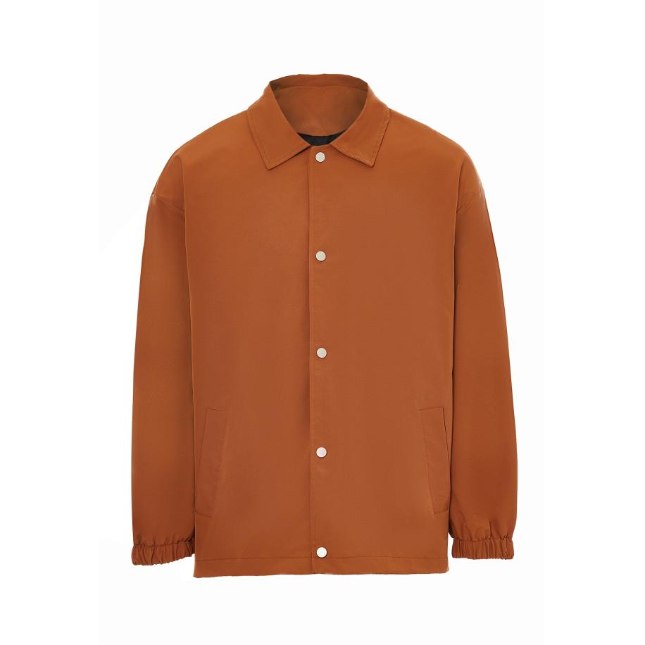 NOWLES NOWLES Tussenjas donkeroranje -