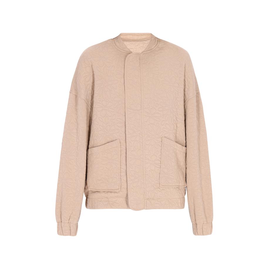 Swirly swirly Tussenjas beige -