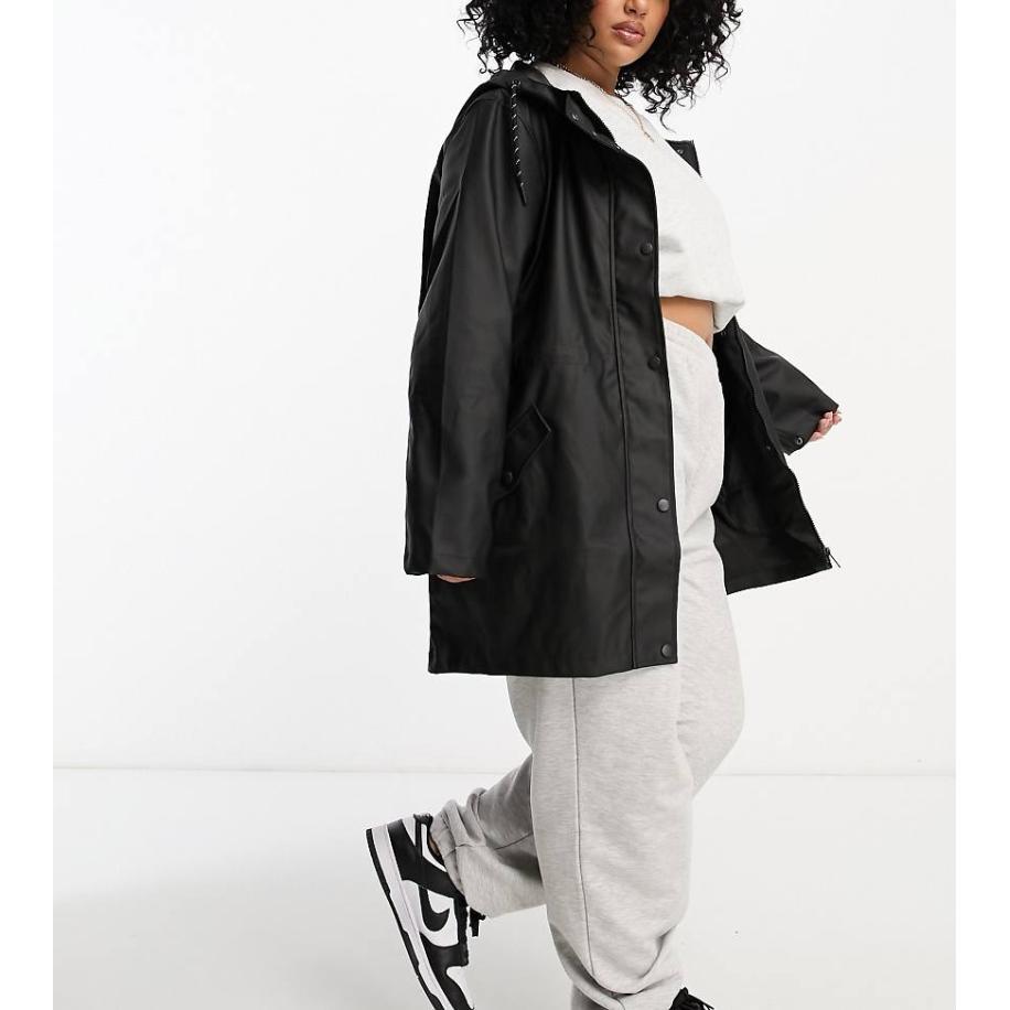Vero Moda Curve Regenjas van rubber met capuchon in zwart Zwart