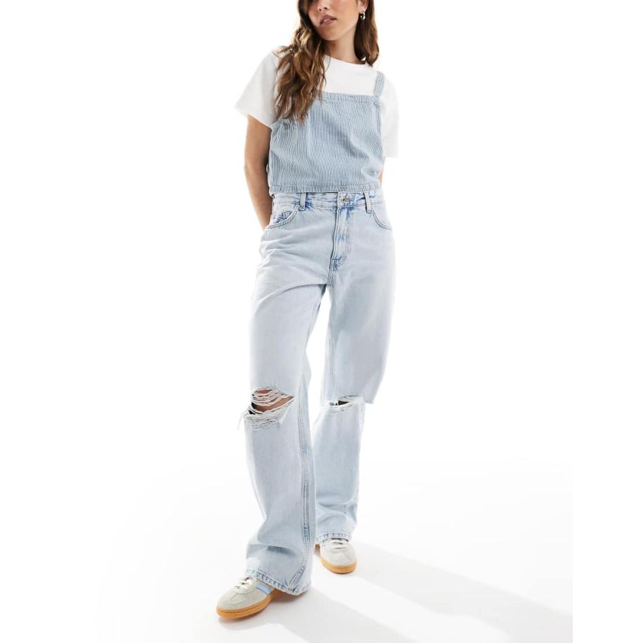 Bershka Jeans met wijde pijpen en gescheurde knieën in super lichte wassing-Blauw Blauw