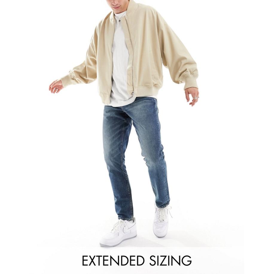 ASOS DESIGN - Smalle jeans in donkerblauwe wassing met tint Blauw