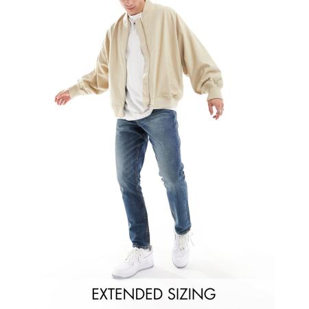 ASOS DESIGN - Smalle jeans in donkerblauwe wassing met tint