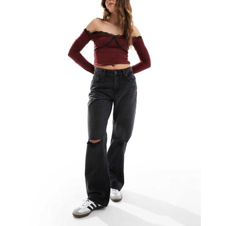 Bershka Jeans met wijde pijpen en kniescheuren in zwart