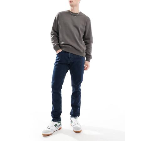 Tommy Jeans - Austin - Jeans met smaltoelopende pasvorm in donkere wassing-Blauw