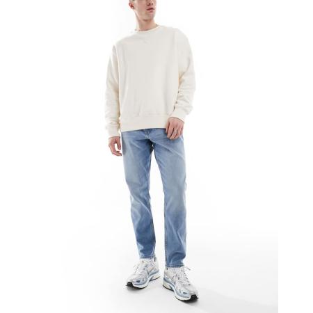 ASOS DESIGN - Smaltoelopende jeans met stretch in lichtblauw met wassing