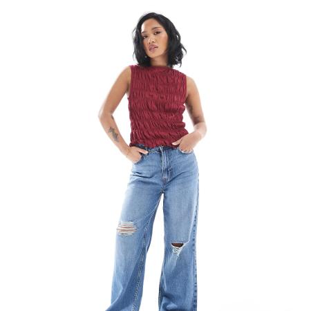 New Look Petite Gescheurde jeans met wijde pijpen in middenblauw