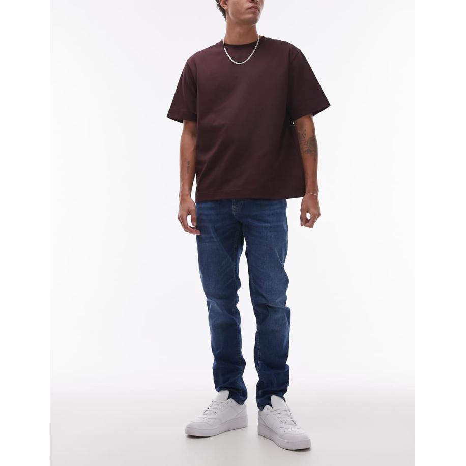 Tommy Jeans - Austin - Jeans met smaltoelopende pasvorm in donkere wassing-Marineblauw Blauw