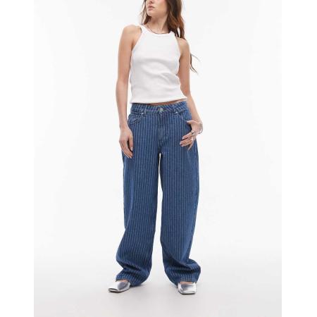 Topshop Ruimvallende gestreepte jeans met lage taille en riempje achter in blauw