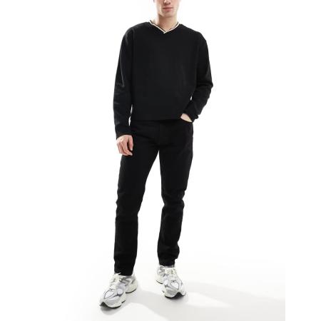 DTT - Stugge, slim-fit jeans in zwart