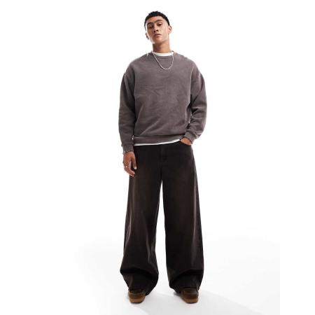 ASOS DESIGN - Super baggy jeans in zwart met wassing en bruine tint