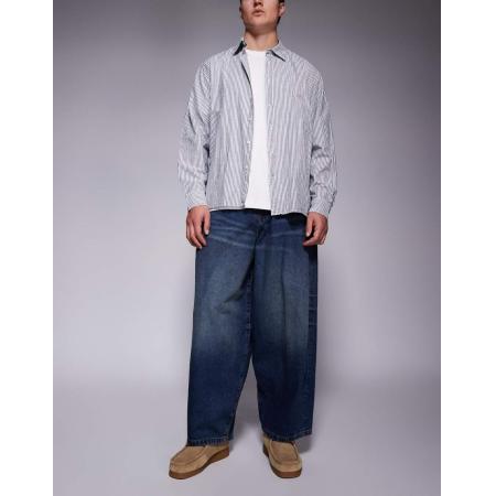ASOS DESIGN - Baggy jeans met ballonpasvorm in vintage blauw met donkere wassing
