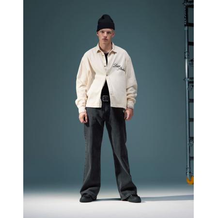 ASOS DESIGN - Flared jeans met wijde pijpen in zwart met wassing