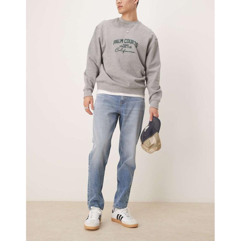 ASOS DESIGN - Jeans met smaltoelopende pijpen in middenblauwe wassing Blauw