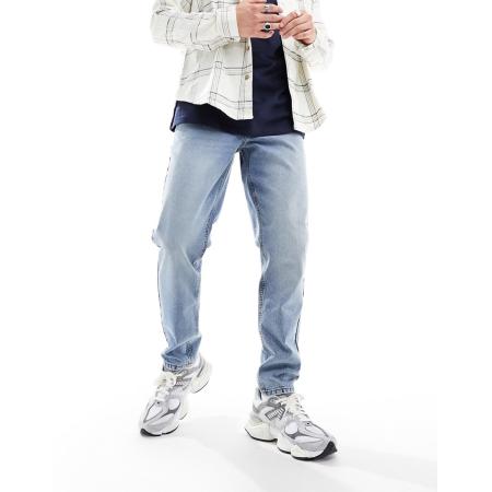 ASOS DESIGN - Toelopende vintage jeans in blauw met lichte gewassen tint