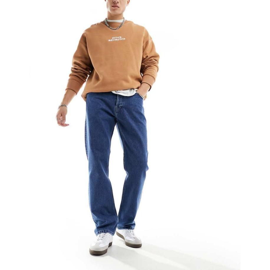 Carhartt WIP - Nolan - Ruimvallende rechte jeans in blauw met wassing Blauw