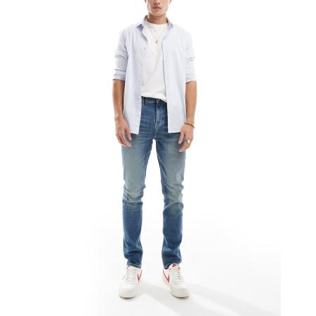 ASOS DESIGN - Skinny jeans met groene tint in blauwe met donkere wassing