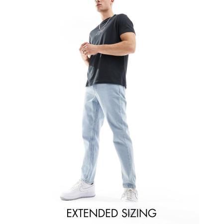 ASOS DESIGN - Jeans met smaltoelopende pijpen in blauw met lichte steenwassing-Zwart