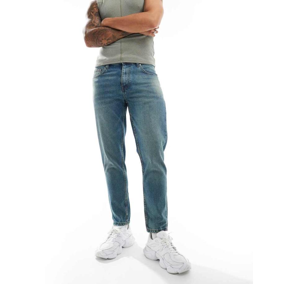 DTT - Stugge toelopende cropped jeans in middenblauw met vintage tint Blauw