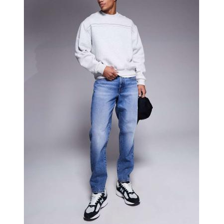 ASOS DESIGN - Jeans met smaltoelopende pijpen in donkerblauwe wassing