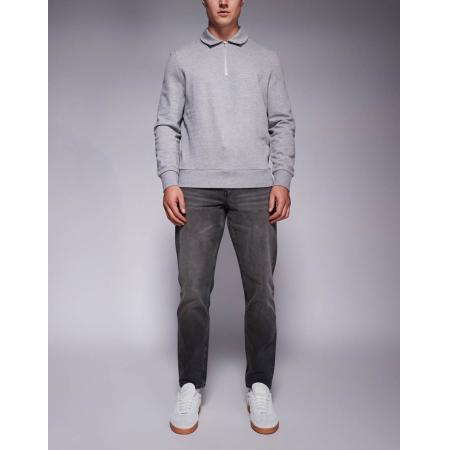 ASOS DESIGN - Toelopende jeans in zwarte wassing