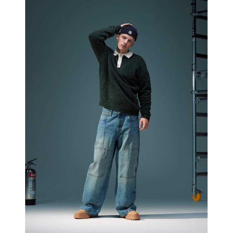 ASOS DESIGN - Super baggy timmermansjeans met tint in mid-wash blauw Blauw