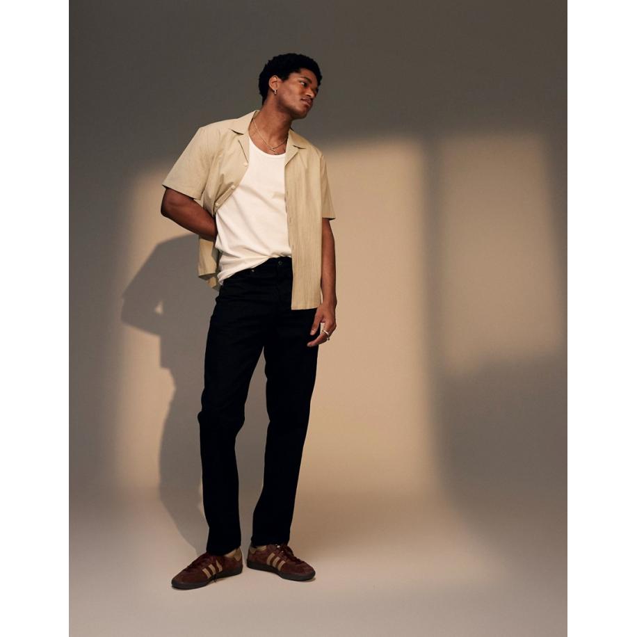 Topman - Stugge toelopende jeans in zwart Zwart