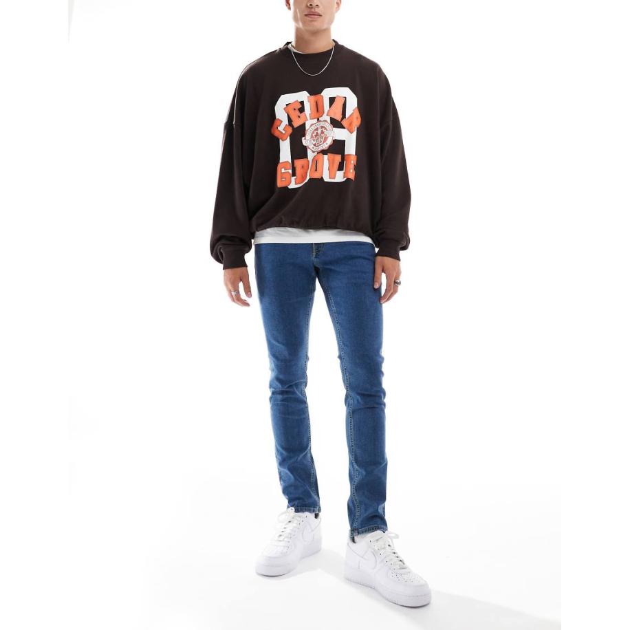 JJ Rebel - Luke - Slim-fit jeans in middenblauwe wassing Blauw