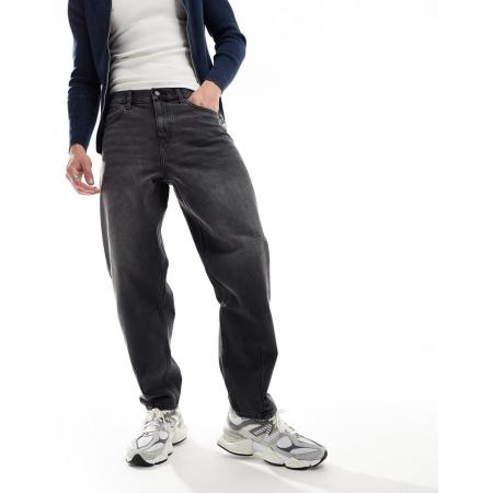 ASOS DESIGN - Ruimvallende jeans met figuurnaden in zwart met wassing