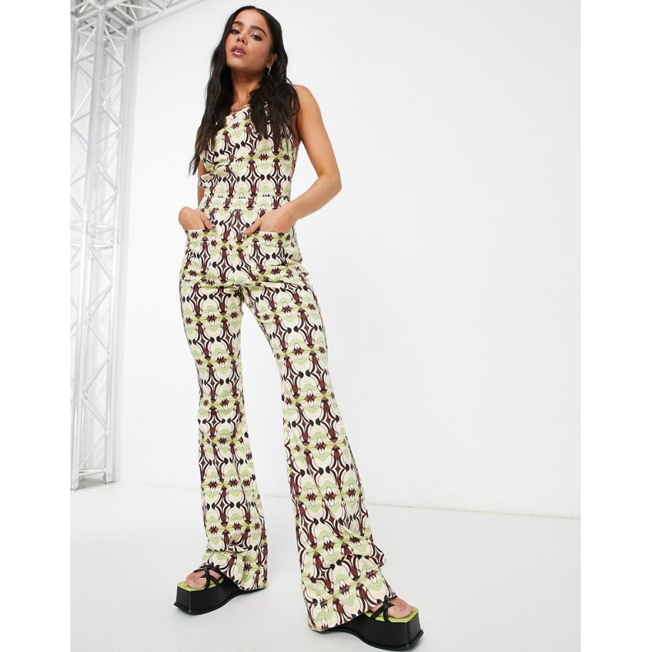 ASOS DESIGN Jumpsuit met halternek en uitlopende pijpen in geoprint-Veelkleurig Multicolor