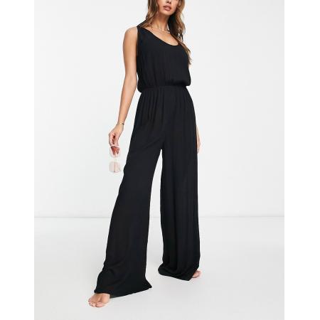 ASOS DESIGN Minimalistische strandjumpsuit met wijde pijpen van kreukelstof in zwart