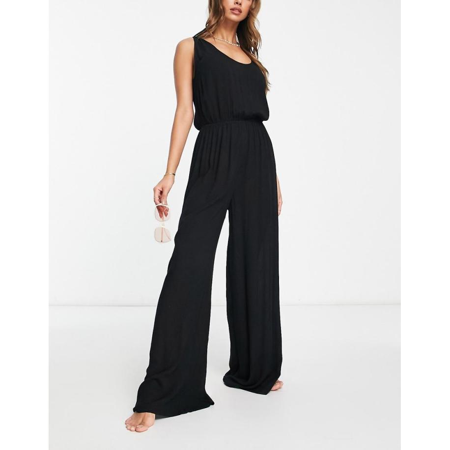 ASOS DESIGN Minimalistische strandjumpsuit met wijde pijpen van kreukelstof in zwart Zwart