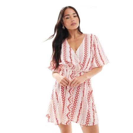 Wednesday's Girl Mini-jurk met overslagdetail en streepprint in roze