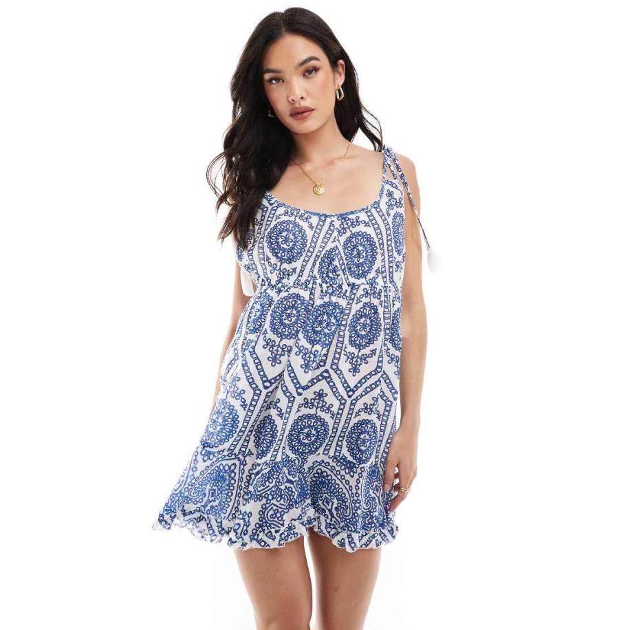 Wednesday's Girl Aangerimpelde ministrandjurk met print en borduursels in blauw Blauw